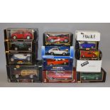 Thirteen boxed diecast models in a variety of scales from 1:18 to 1:43 by Maisto, Bburago,