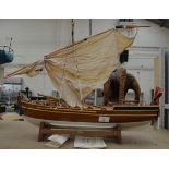 A good quality model of an 1803 Royal Navy Armed Cutter ship by Nauticalia, London.