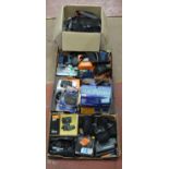 4 boxes of assorted cameras (including FujiFilm), binoculars (including Prinz and Canon),