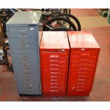 3 metal filing cabinets - one contains assorted tools.