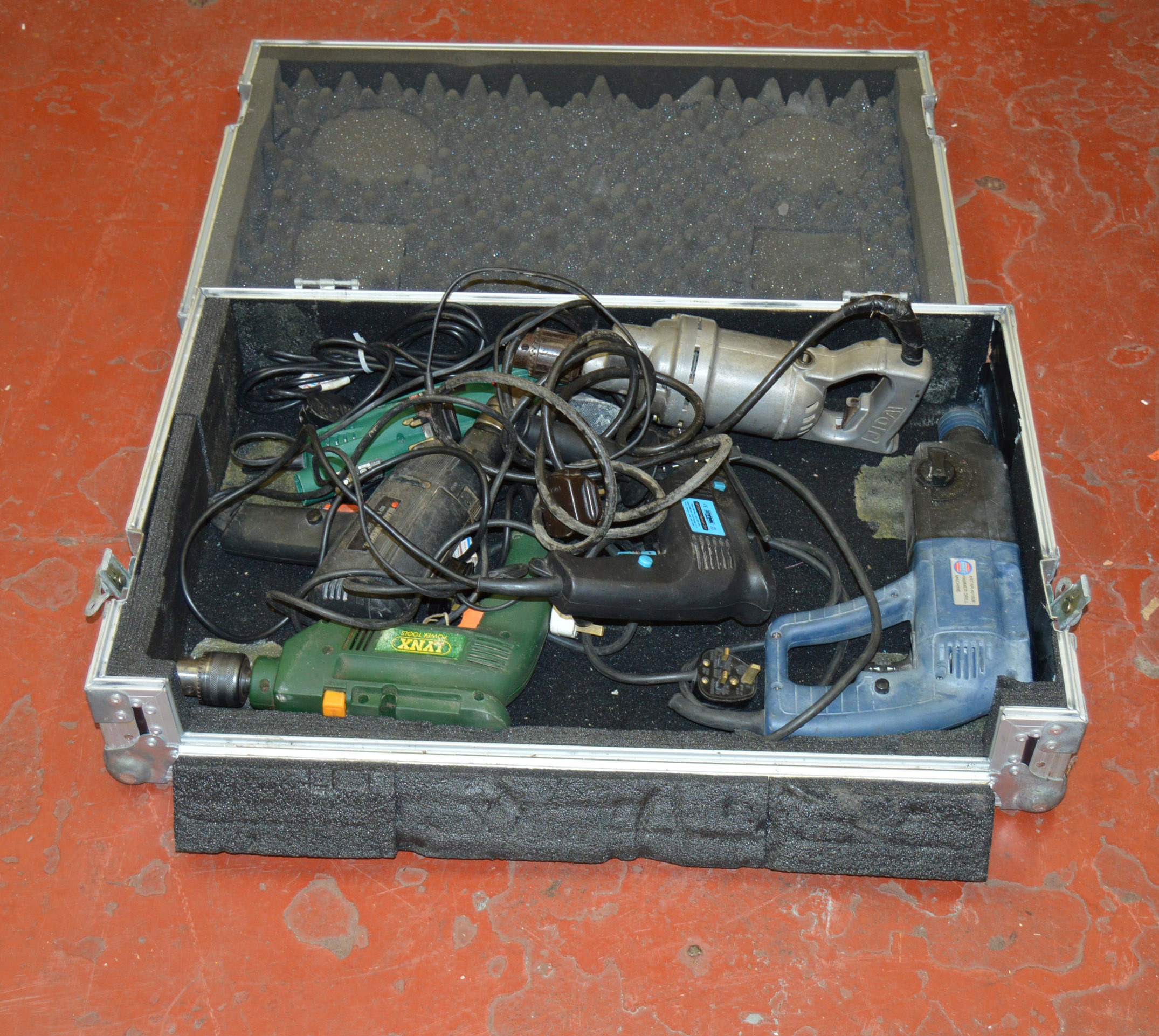 Case containing 6 assorted power tools.