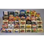 Thirty six boxed Lledo diecast model vehicles together with a boxed EFE Cavalier Coach,