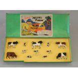 Britains Model Farm No. 122F, containing 12 cattle.
