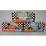 Three Scalextric Race Tuned slot cars: C79 Offenhauser Front Engine Grand Prix in blue;
