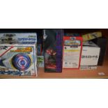 A quantity of assorted Transformer type and Anime figures and related accessories including DVDs