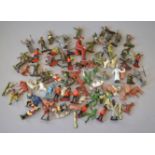 A mixed lot of loose metal and plastic figures including soldier figures,