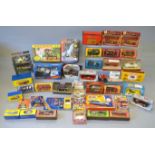 A mixed lot of boxed and carded diecast models by Matchbox including several different models from
