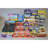 A mixed group of boxed and carded diecast models by Corgi,