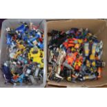 Large quantity of Hasbro/Takara Transformers and similar transforming toys by Bandai and others.