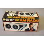 James Bond 007. Vanity Fair James Bond Solid State AM Radio, in the shape of '007', c.1973.