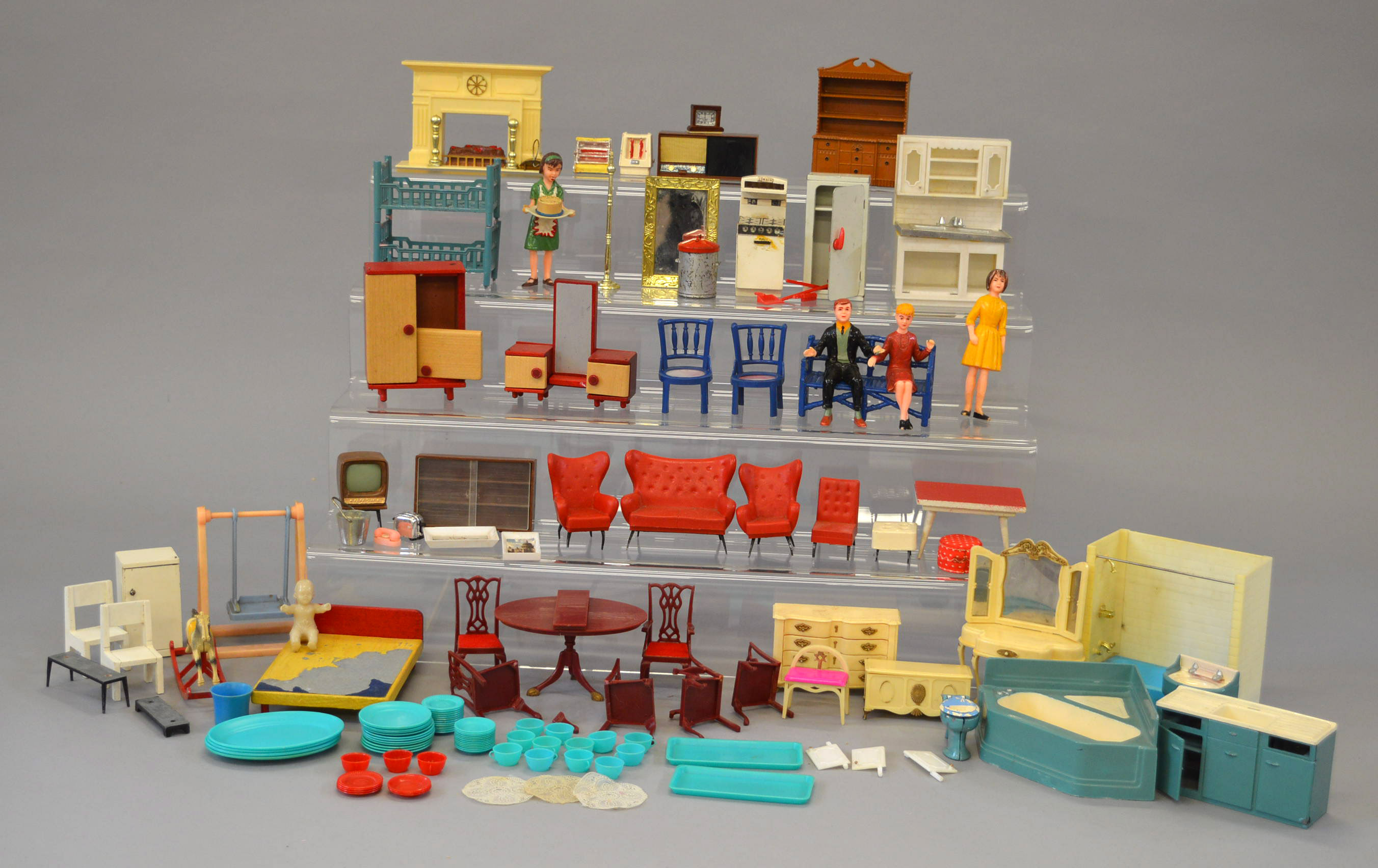 Good quantity of dolls house furniture and accessories, plastic, tinplate and wood.