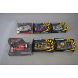Six boxed 'Scalextric' and other slot cars,