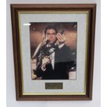 Timothy Dalton autographed photo in frame featured in his role as James Bond in "The Living