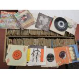 Box of 7" singles in wooden box some with sleeves most with cardboard covers,