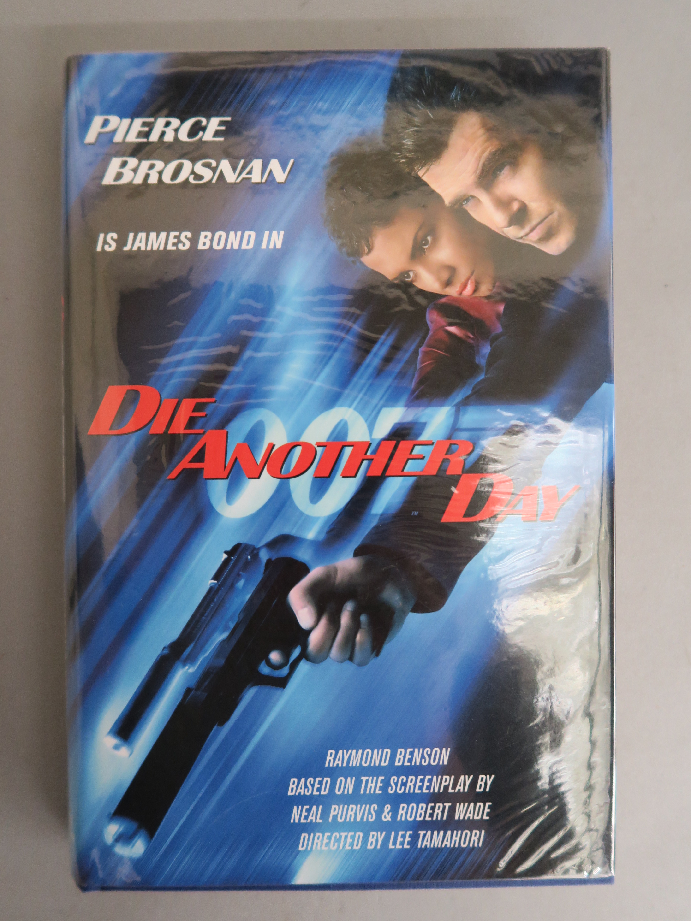 James Bond related books "Die Another Day" hard-back book with dust jacket signed by author Raymond - Image 6 of 7