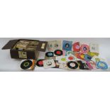 Box of 7" singles including Slade, Cat Stevens, Otis Redding, The Rolling Stones, Lou Reed,