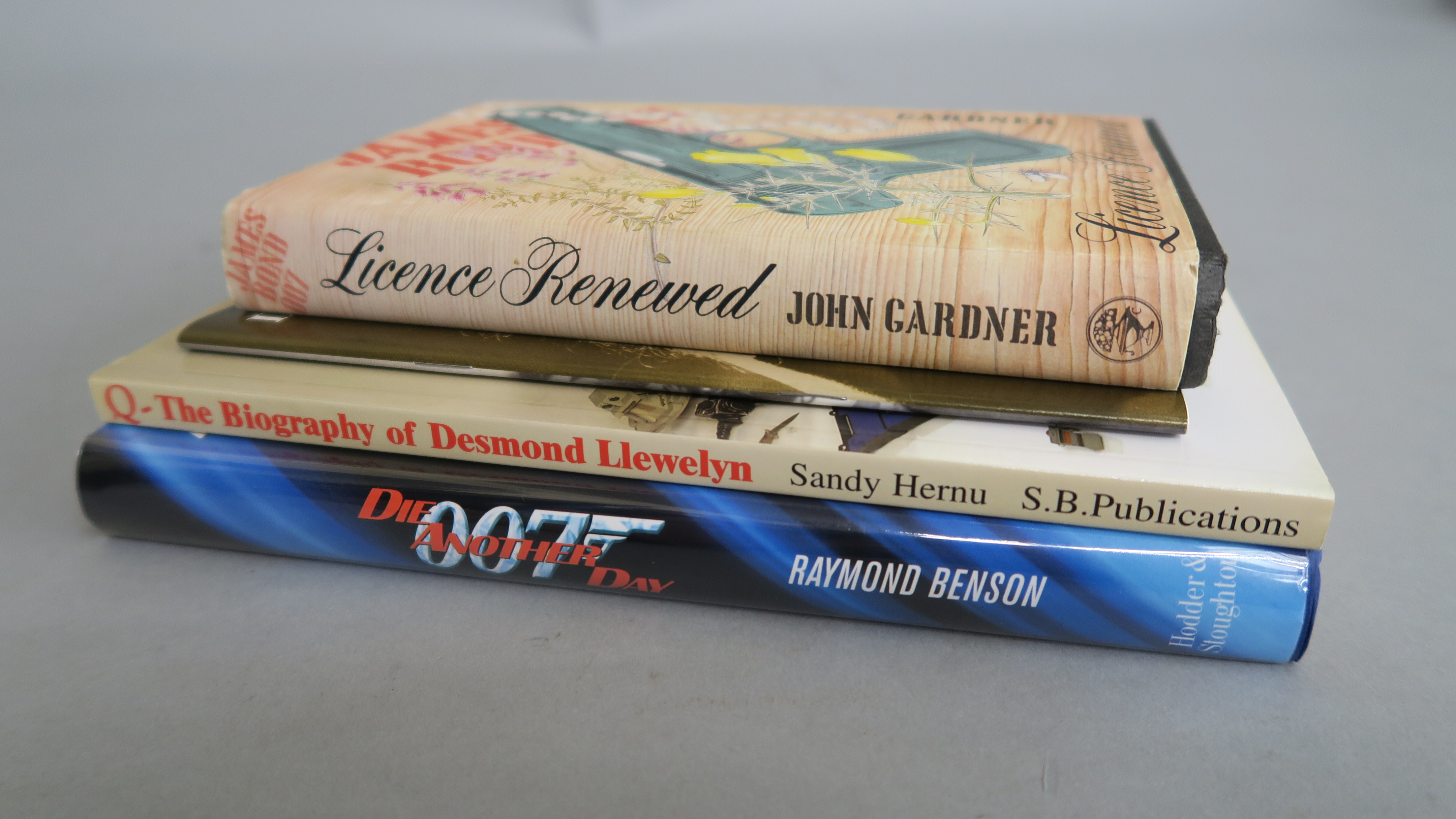 James Bond related books "Die Another Day" hard-back book with dust jacket signed by author Raymond