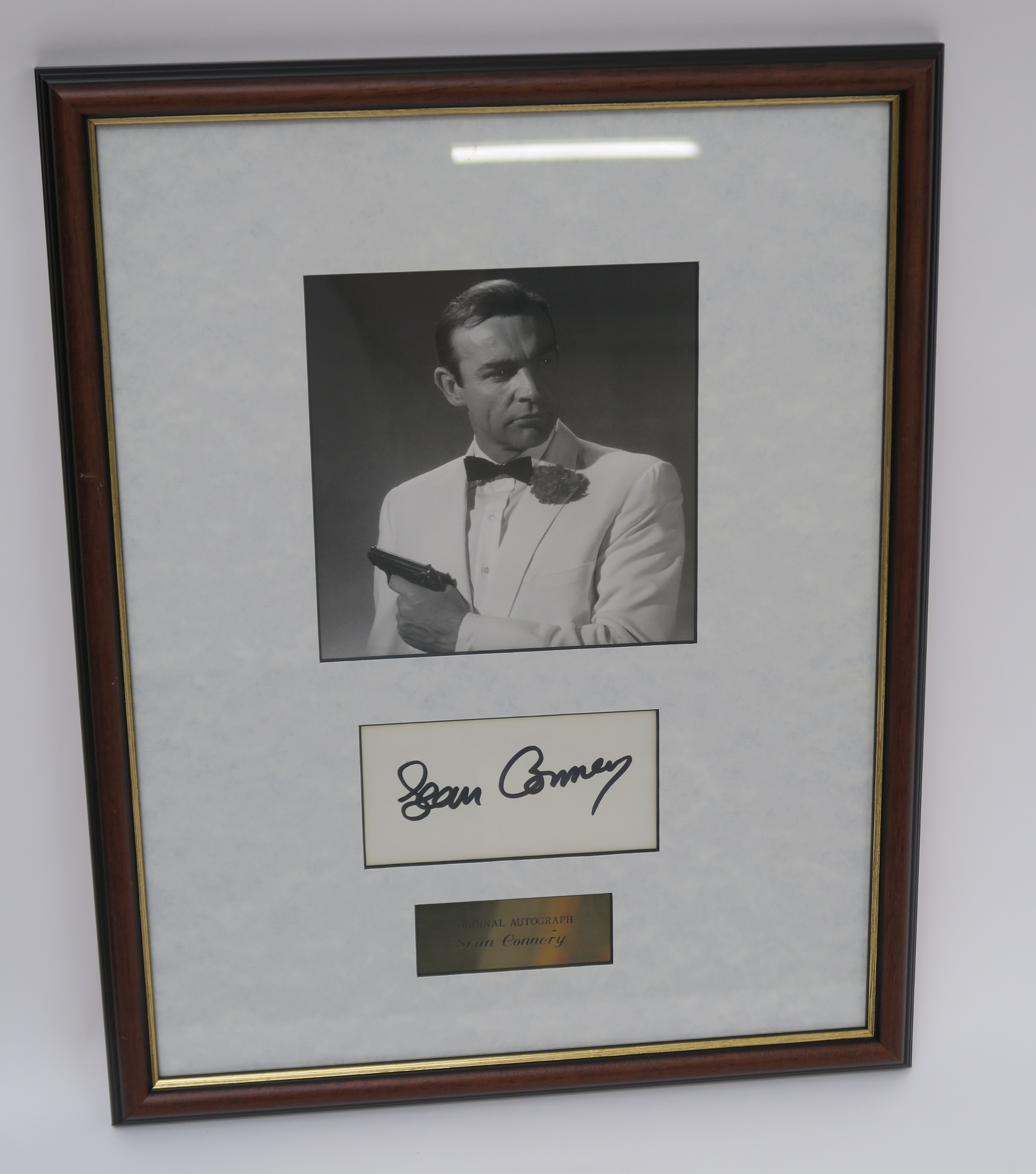 Two Sean Connery autographs, one on his photo and one under photo with C.O.A. on reverse. - Image 3 of 3