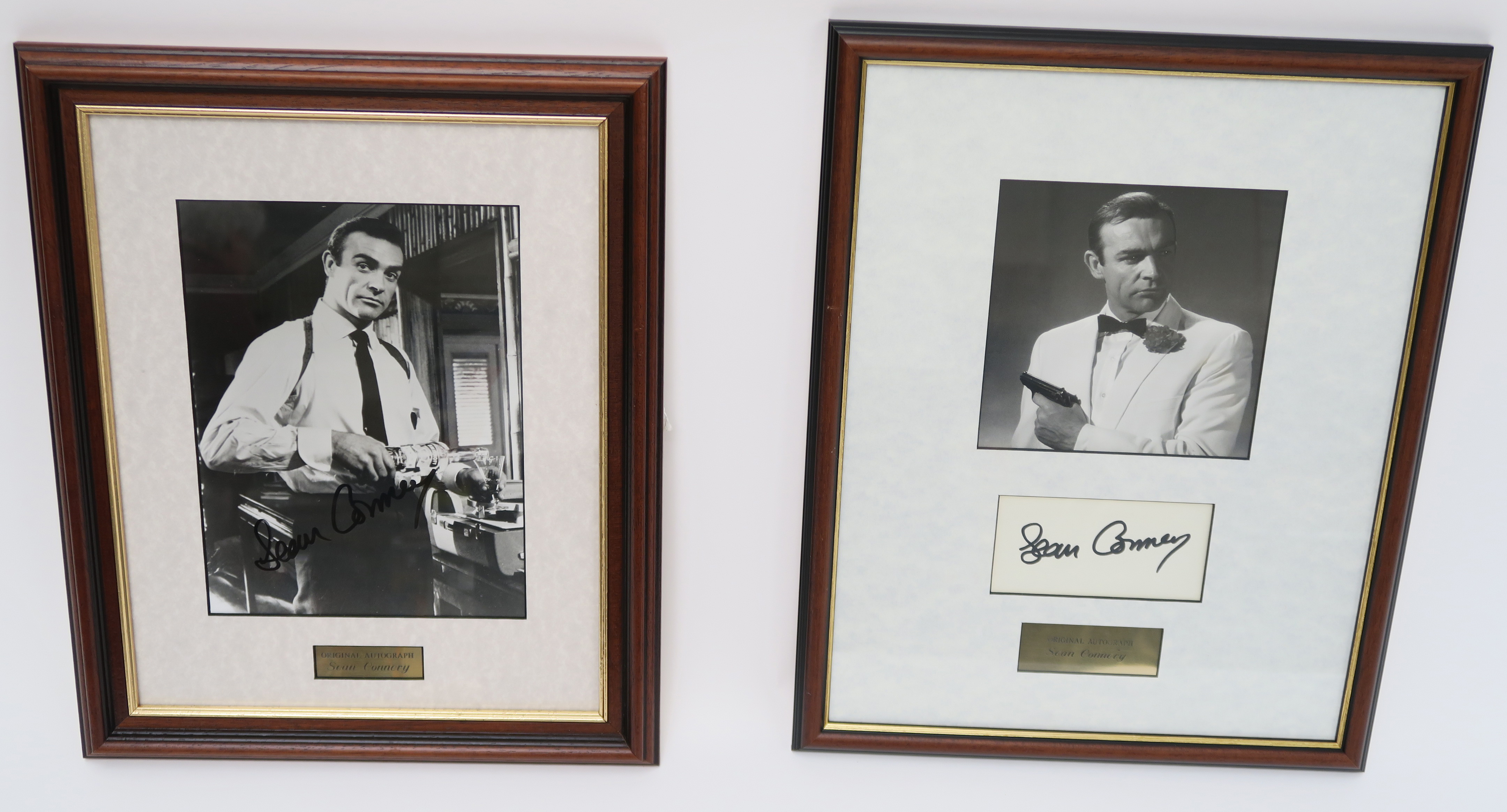 Two Sean Connery autographs, one on his photo and one under photo with C.O.A. on reverse.