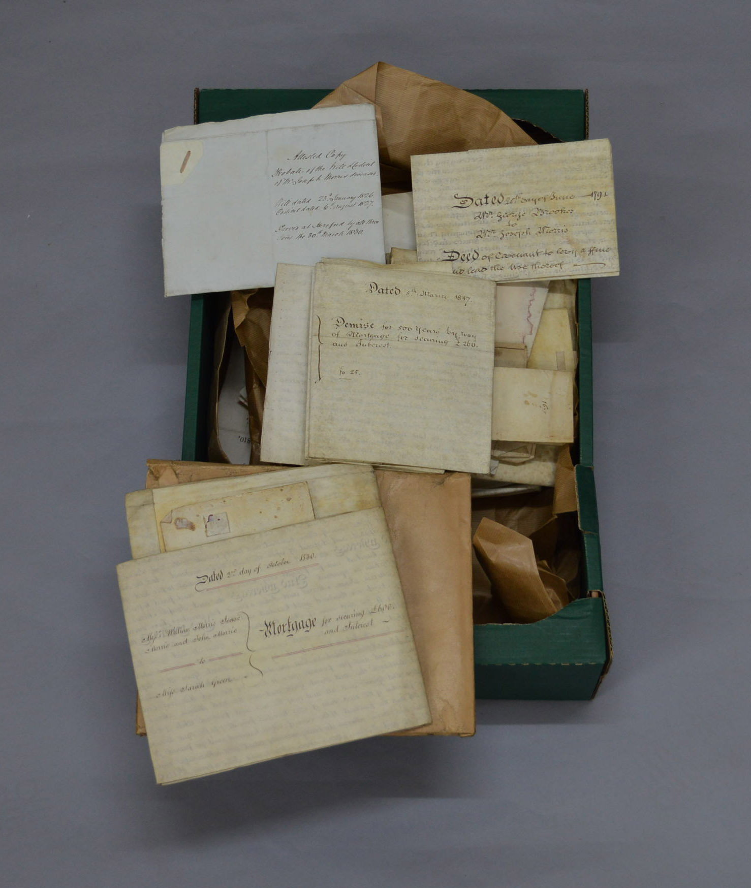 A collection of assorted indentures and historical documents, mostly 19th century examples.