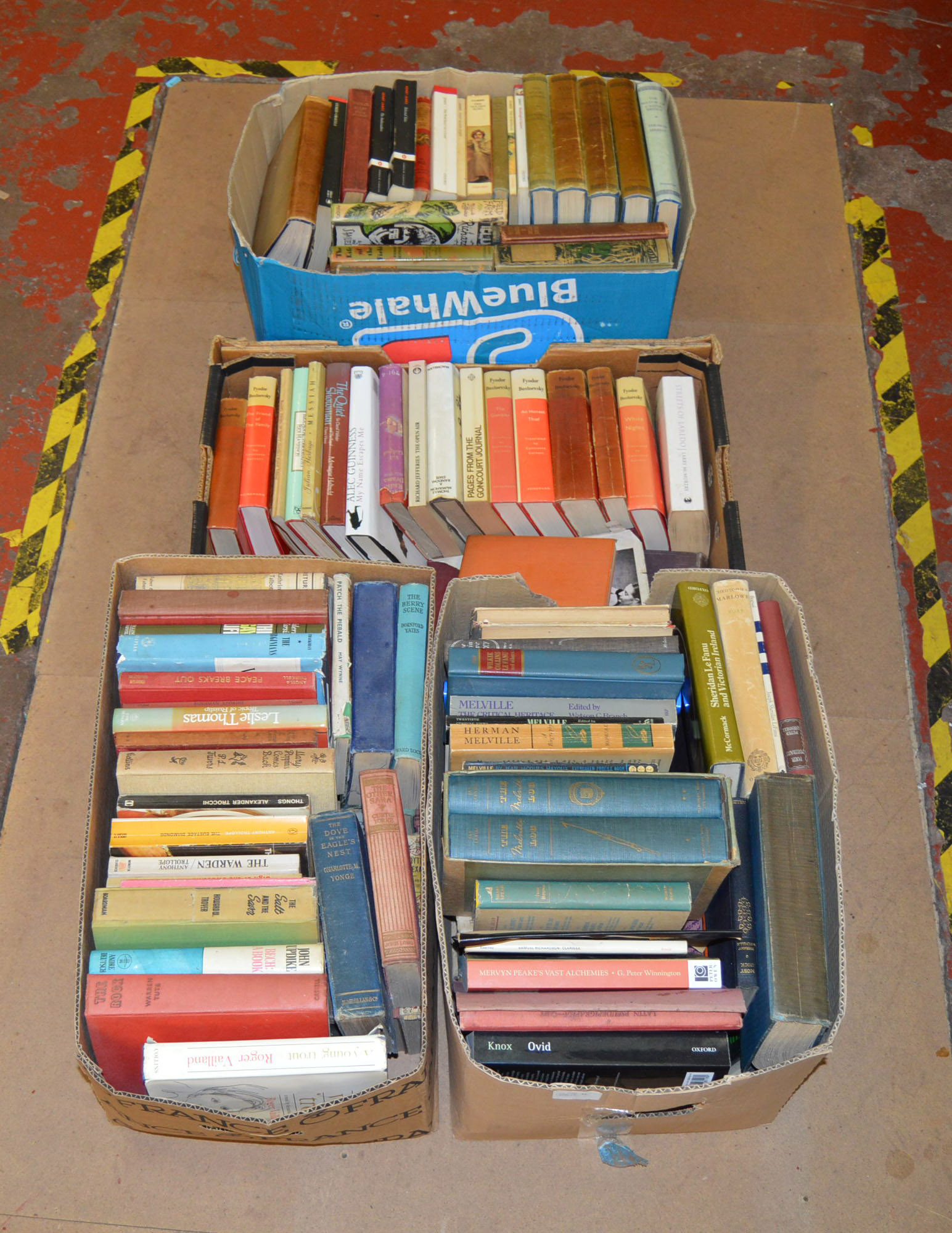 4 Boxes of assorted vintage books including fiction and non fiction.