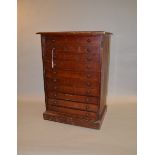 A small wooden plan chest (missing front door panel. 70cm tall.