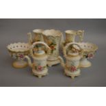 A large Capo De Monte set comprising jugs, vases,