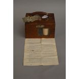 A wooden cased Alfred Plasschaert Pigeon-Timer with instructions,