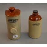 2 vintage stoneware bottles for Timothy Whites & Taylors Chemist and household Stores