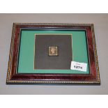 A 4-margin penny black 1d stamp with red MX. in framed.