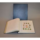 A Stanley Gibbons Great Britain Luxury stamp album containing various Victorian stamps including
