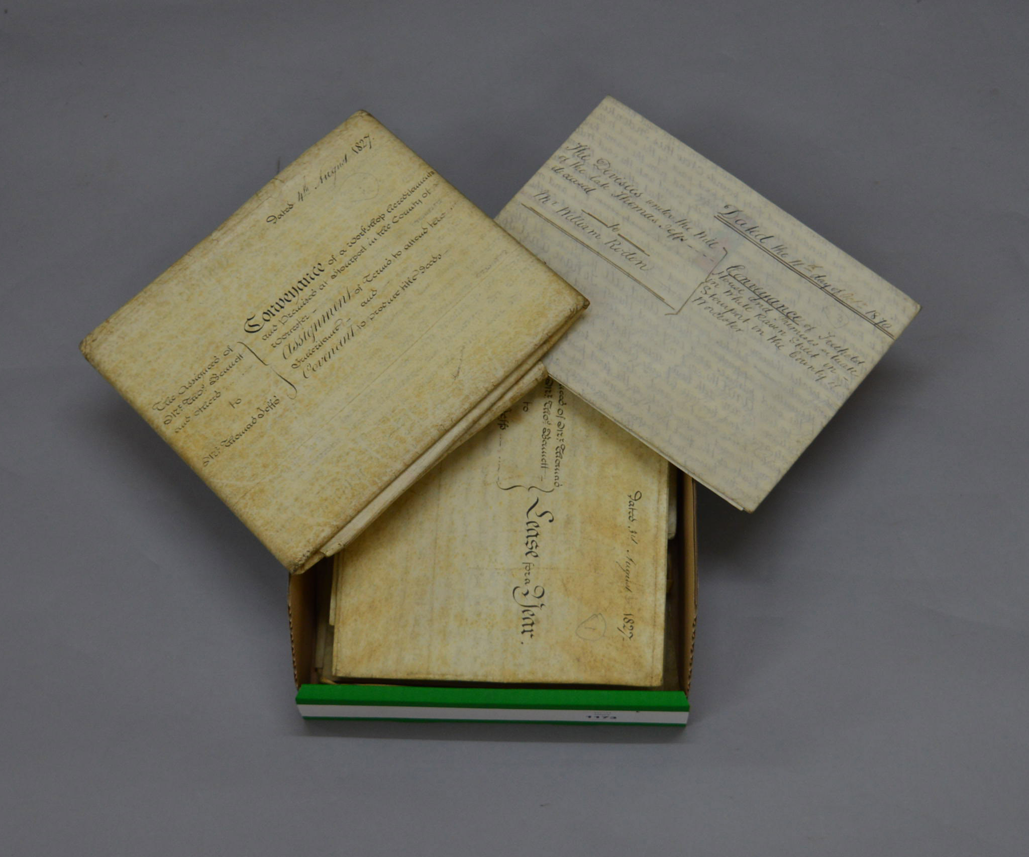 A collection of indentures including 18th and 19th century examples.