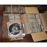 A large collection of singles and vinyl records.