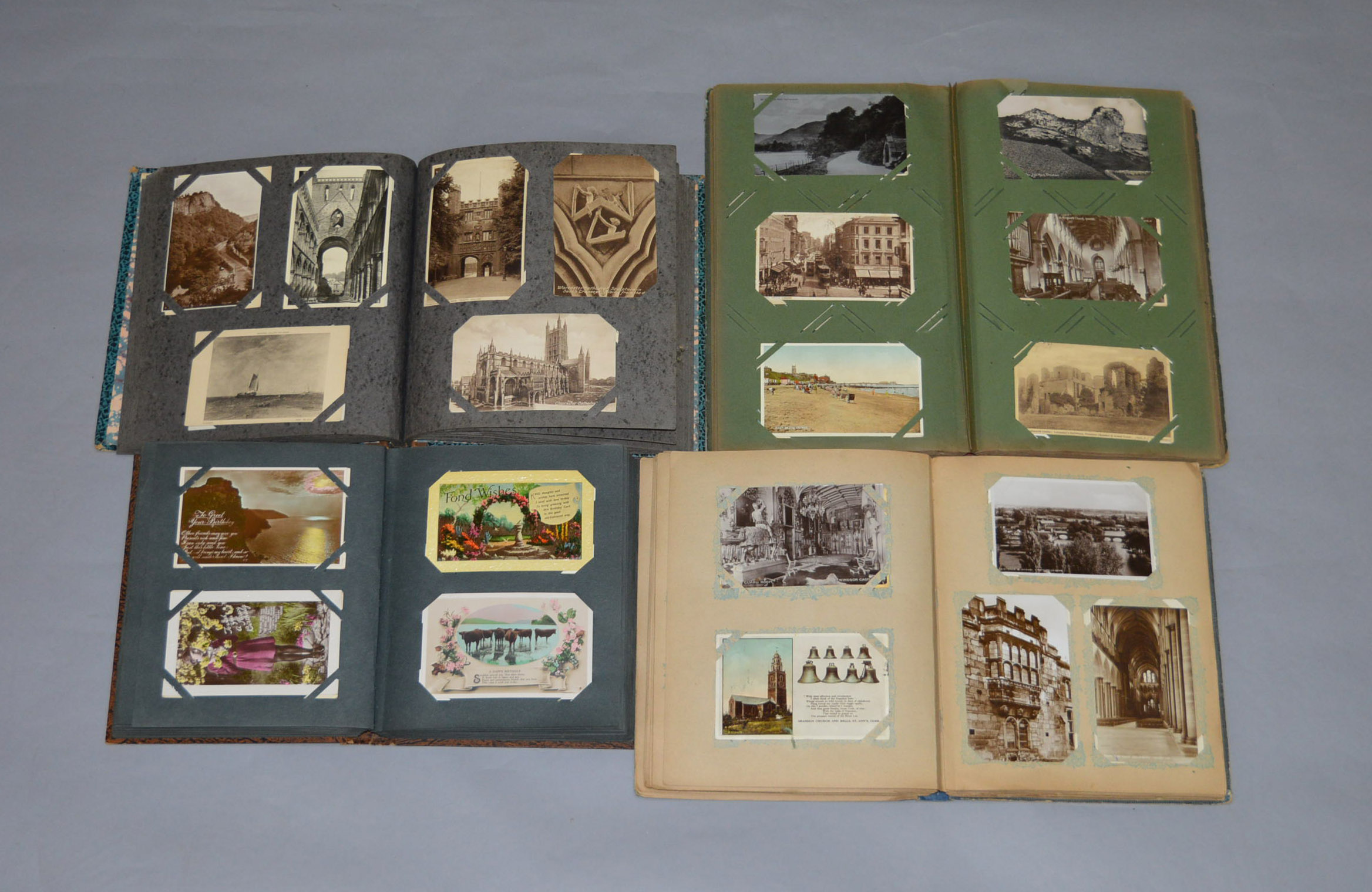 4 early 20th century postcard albums containing a good selection of cards, various themes.