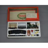 A Boxed Mamod Steam Railway Set RS1 with Locomotive, 2 Goods Wagons,