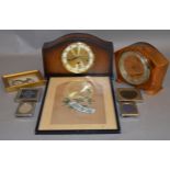 A mixed lot including two mantle clocks, plated picture frames,