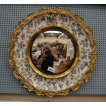 A 1960s Burleighware mirror with ceramic and gilt metal bordering. 48cm diameter.