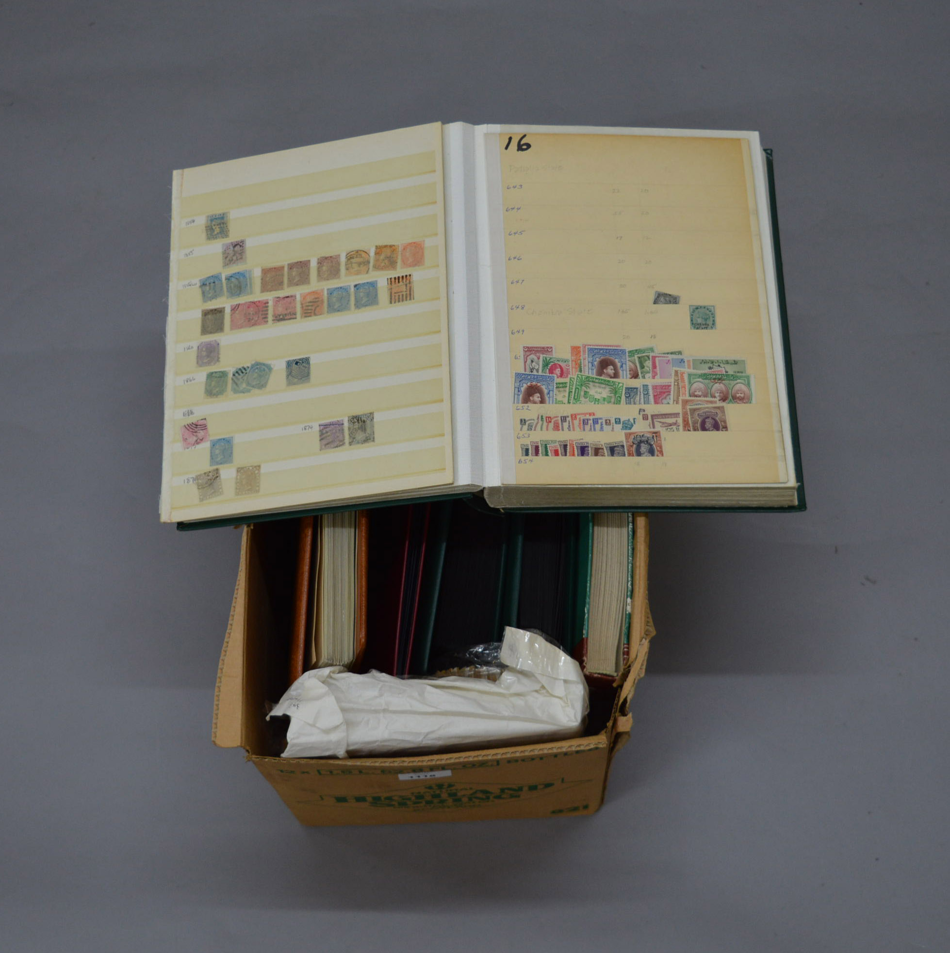 A collection of assorted stamps including Indian and British examples, mostly contained in albums.