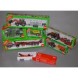 Seven boxed Agricultural diecast models by Siku in 1:32 scale.