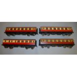 O gauge. Four Bassett-Lowke coaches in red and cream. A/F.