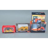 Four boxed diecast model Construction Vehicles in 1:50 scale by Motorart, Norscot and others,