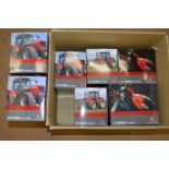 Seven Universal Hobbies 1:32 scale diecast model Massey Ferguson tractors.