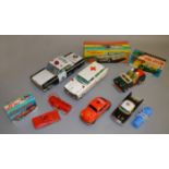 Six tinplate emergency vehicles, three boxed. F-G+.