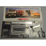 A boxed Wedico (Germany) stainless steel and aluminium 1:16 scale model Truck kit in black,