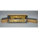 O gauge. Two brass coaches: Suburban Brake Coach; First Corridor Coach. VG, boxed.