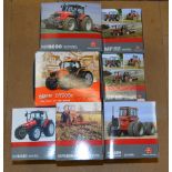 Six boxed Universal Hobbies diecast model Massey Ferguson Tractors in 1:32 scale together with a