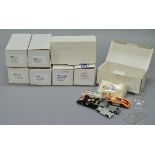Five boxed resin model motorcycle kits in 1:43 scale by MEA together with a white metal car kit