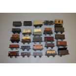 O gauge. An assortment of kit built, plastic and metal rolling stock and loads by various makers.