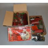 A quantity of unboxed well used Meccano red and green parts,