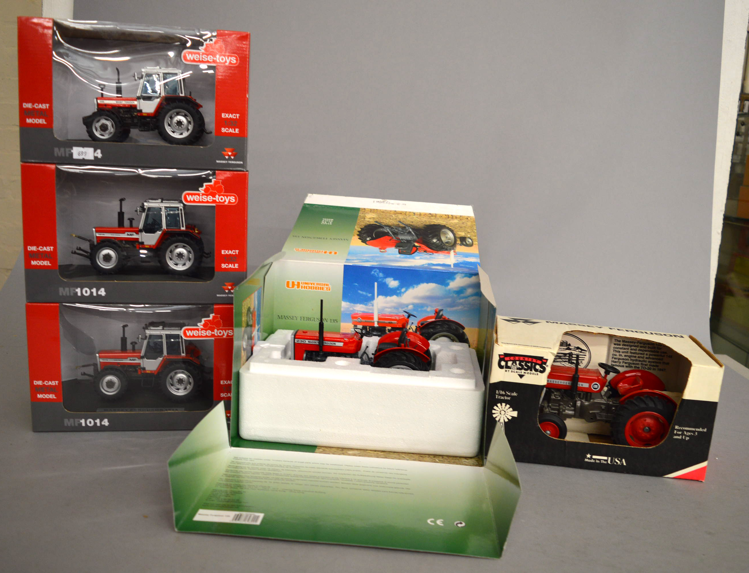 Three boxed Weise Toys Massey Ferguson Tractor models in 1:32 scale,